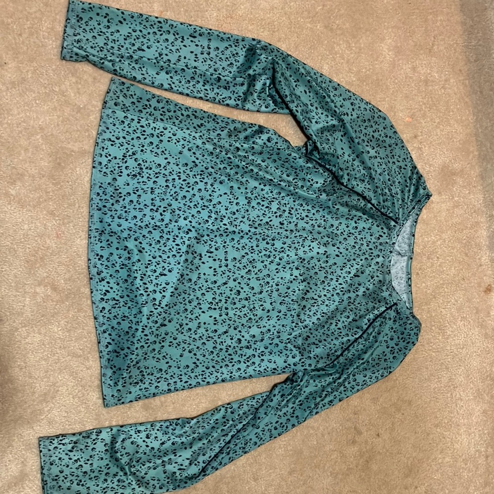 KIDS size L athletic swim shirt. Quick dry bathing suit material. Never worn.